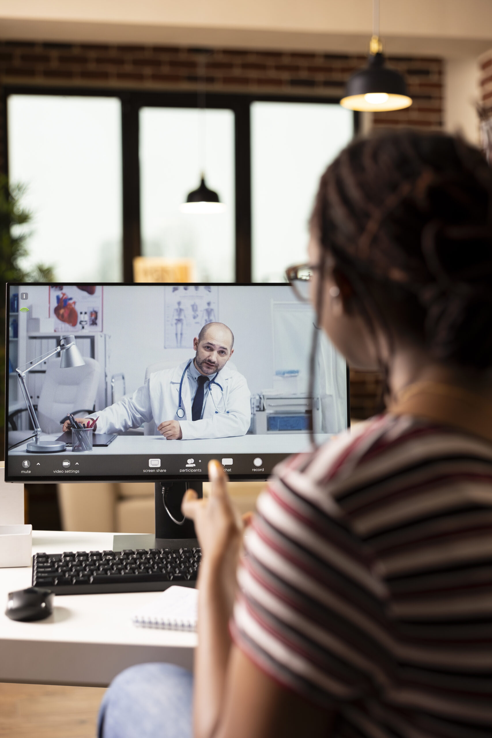 Patient consulting online second opinion services for spine surgery.