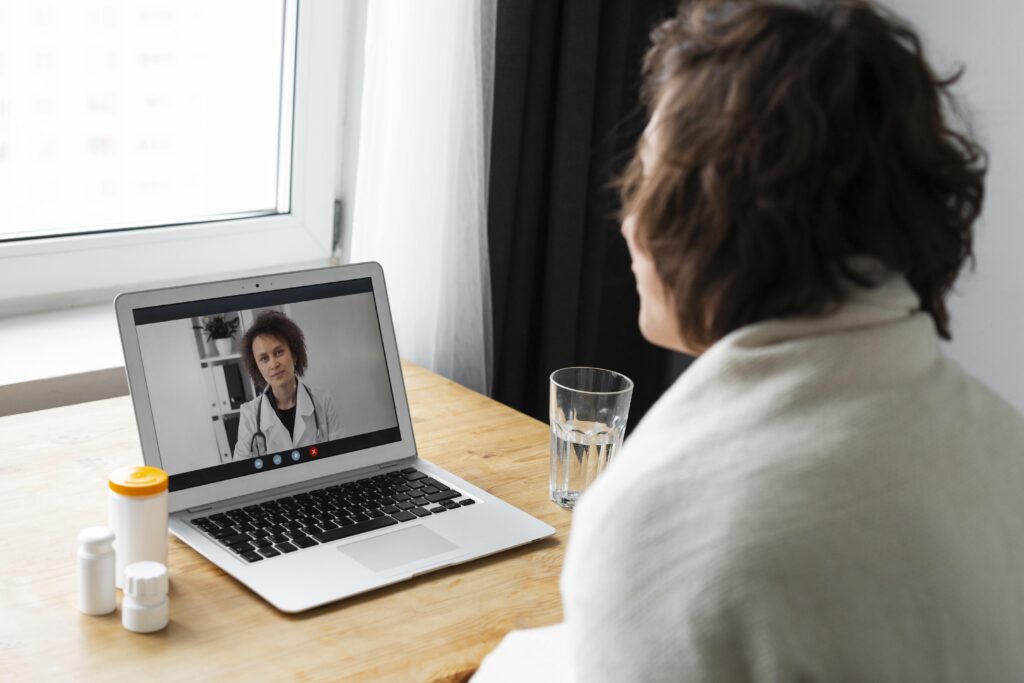 Spine surgeon providing remote consultation via online second opinion services.